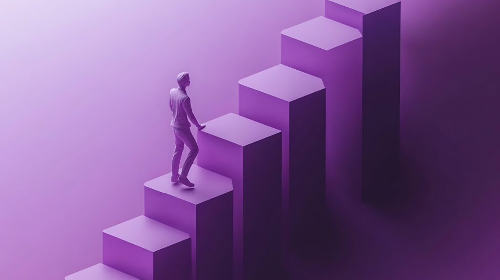 Como reter talentos em TI: estratégias para líderes 1 A imagem mostra uma pessoa subindo uma escada, em representação ao desenvolvimento profissional, uma das formas mais eficazes de reter talentos.