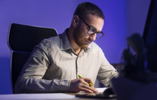 medium-shot-man-working-late-night