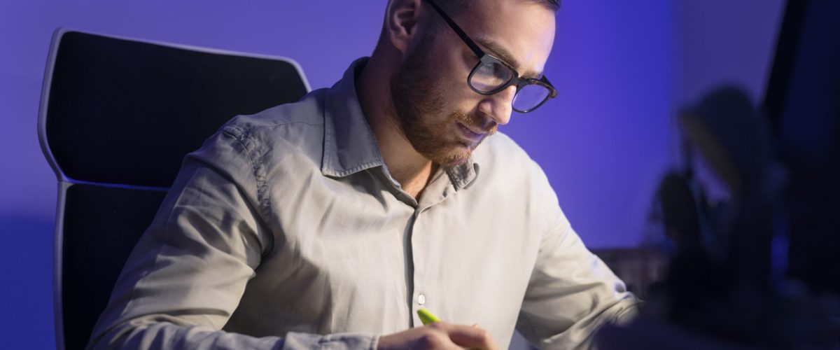 medium-shot-man-working-late-night