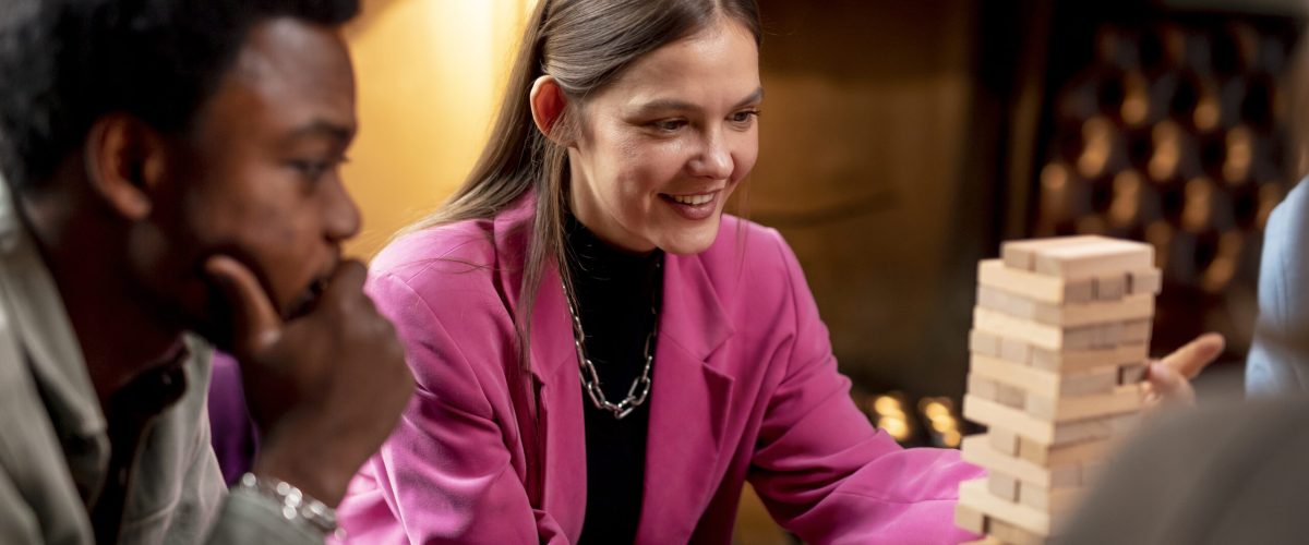people-playing-wooden-tower-game