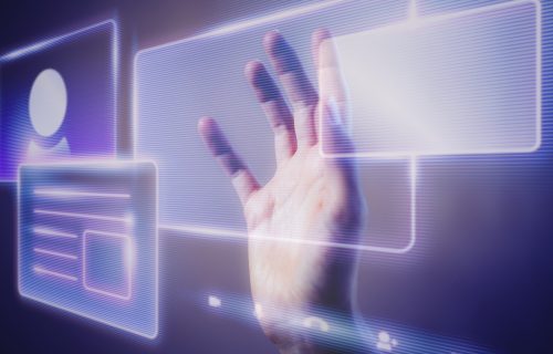 Woman touching a smart technology holographic interface